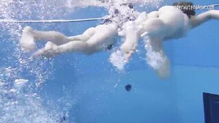 Enjoy a redhead underwater and lesbians