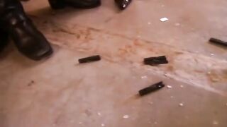 Mistress Saskja dominates a slave and a slave girl at the same time in her garage.