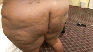 Horny black BBW sucks on her lovers strap-on