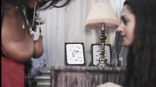 Two lusty ebony harlots have some naughty lesbian bedroom fun