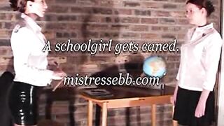 Mistress E canes a student
