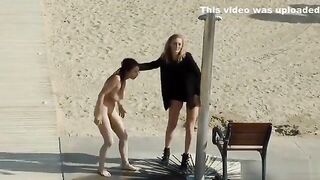 Lezdom disgrace and zapper on the beach