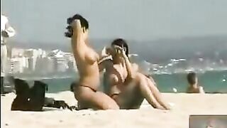 2 friends get naughty on the beach