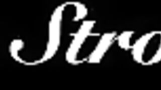 Ebony lesbian couple fucking with strap-on and toys on the couch