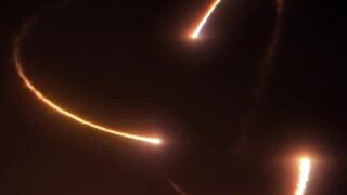 Latex fetish lesbians gettting wet together in the wilderness