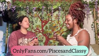 Curvy Ebony and Latina lesbian couple make out and titty suck during a game of Uno