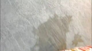 Two naughty German chicks pissing and dildoing on the couch