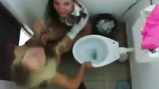 Two amateur lesbians fucking in the toilet