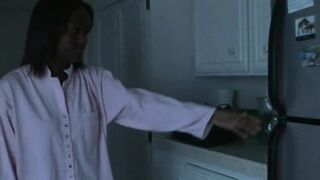 A Black Kitten with a Mature Woman. 