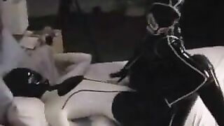 Cute teens making out in latex catsuits
