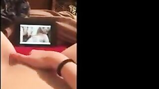 Girl watching lesbian porn has her own orgasm
