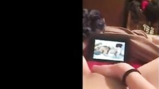 Girl watching lesbian porn has her own orgasm