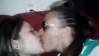 Two Shy Girls kissing