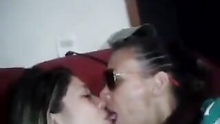 Two Shy Girls kissing