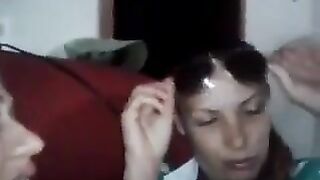Two Shy Girls kissing