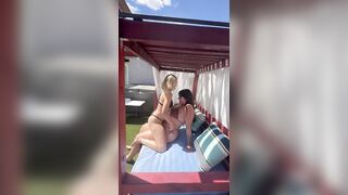 Lesbians making out before fucking outside in pool cabana