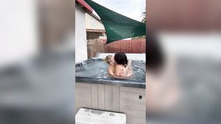 Lesbian couple has a passionate make-out in their new jacuzzi