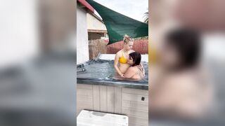 Lesbian couple has a passionate make-out in their new jacuzzi
