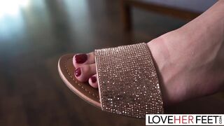 Cody worships Gal's feet as he strokes his cock before watching as she delivers a sensual footjob. The tattooed hottie gives