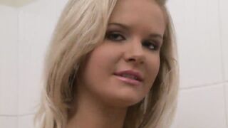 Blonde slut shoves a dildo in sexy brunettes tight slit