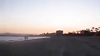Girls kissing in the beach