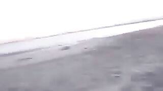 Girls kissing in the beach