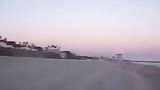 Girls kissing in the beach