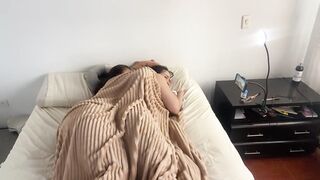 Lesbian sex under the covers on a cold morning
