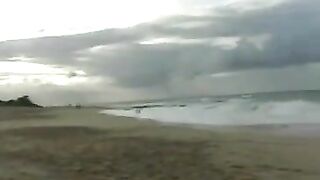 Two lesbians puts on a show for the boys on a beach!