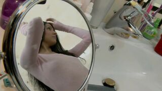 Hot cutie is fingering a sexy brunette in the bathtub