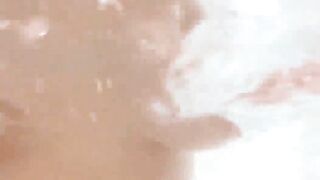 Cuties with big natural boobs having fun in the big tub