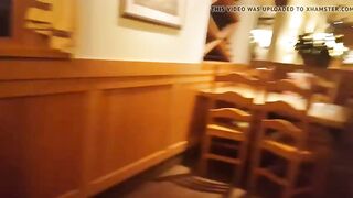 teen getting her pussy licked in public in a restaurant.