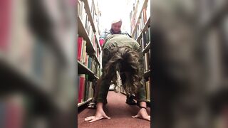 Amateur Lesbians Fuck With a Strap-On in a Library