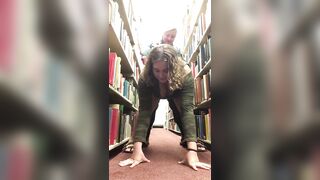 Amateur Lesbians Fuck With a Strap-On in a Library