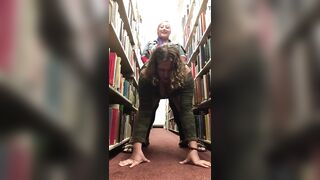 Amateur Lesbians Fuck With a Strap-On in a Library