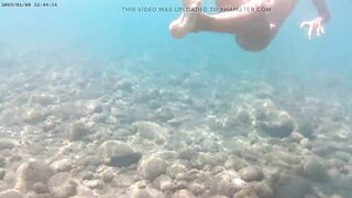 Exhibitionist girl public beach nude sunbathing and masturbating underwater