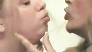 GIRLS KISS LONG TONGUES