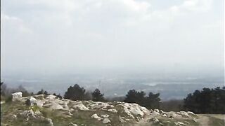 Redhead gangbanged outdoors on hill