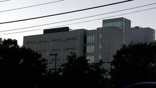 Blondie shoves a dildo in horny babe's cunt in bed