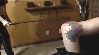 Cute redhead gets dominated by redhead in black leather