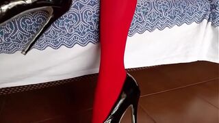 The milf with beautiful legs, red pantyhose and black heels