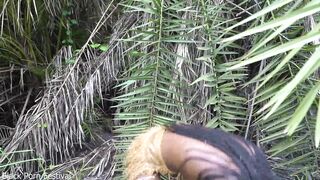 Hot African native woman cooking in the jungle