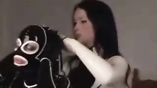 Lesbian couple enjoy in rubber catsuit