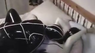Lesbian couple enjoy in rubber catsuit