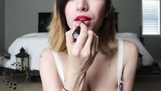 MILF sucks her enormous tits with lipstick on until they start lactating