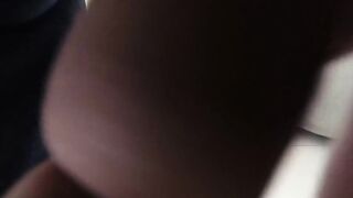 A girl walks in a short skirt without panties in a shopping mall