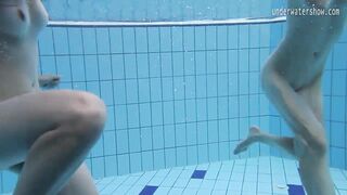 Two hot lesbians in the pool loving eachother