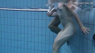 Two hot lesbians in the pool loving eachother