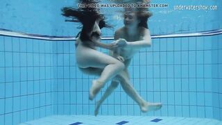 Two hot lesbians in the pool loving eachother