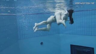 Two hot lesbians in the pool loving eachother